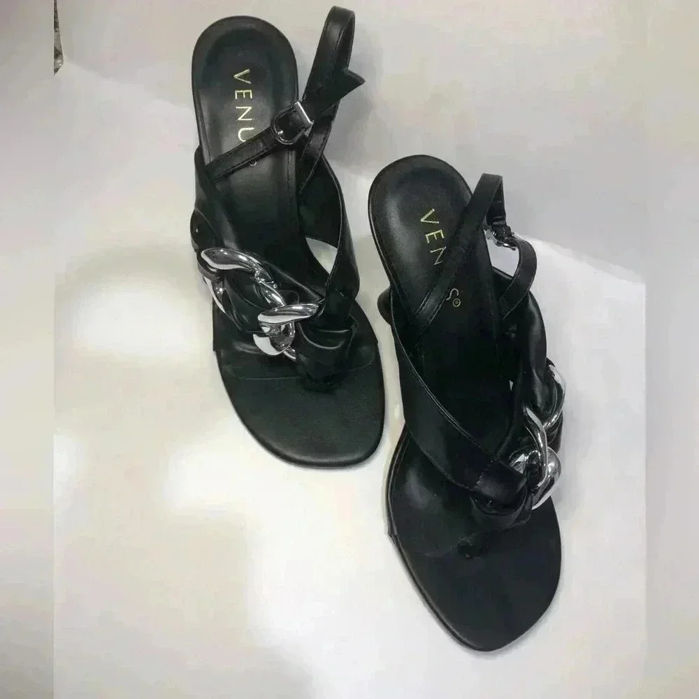 Black and silver heels size 7.5